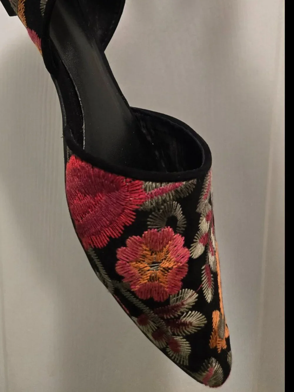 MIA Caroline Floral Embroidered d'Orsay Pointed Toe Flats on Black Background